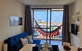 Flat Belo Mar - apto novo com varanda e vista mar